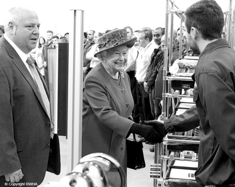 The Queen meets JLR staff during her visit to open a new engine factory in 2014.